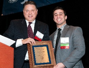 In January, Sam Jones (l), chapter president, recognizes Artin Boghozian as the chapter�s SuperNOVA.
